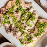 cold ginger chicken topped with scallion sauce.