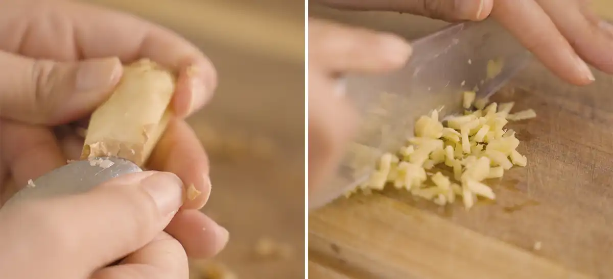Hands peeling a knob of fresh ginger, then mincing the peeled ginger on a wooden cutting board