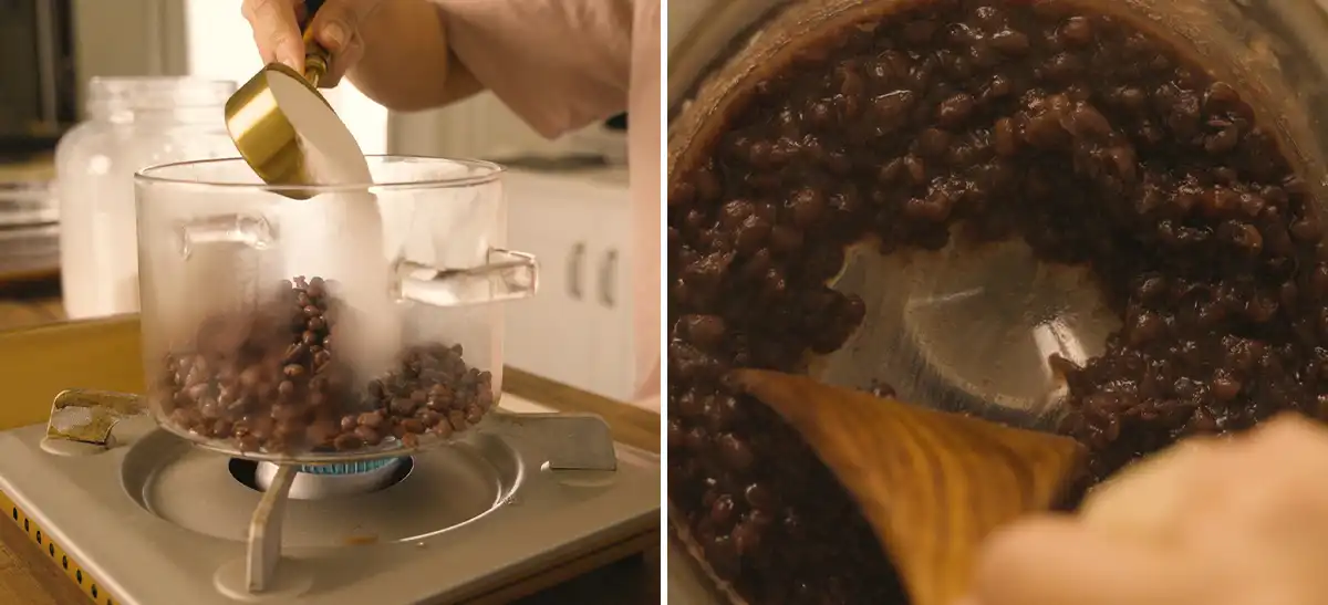 Sugar being measured and added to a glass pot of cooked azuki beans over a gas burner (left); a wooden spoon stirring azuki beans and sugar together in a pot, the mixture beginning to thicken (right)