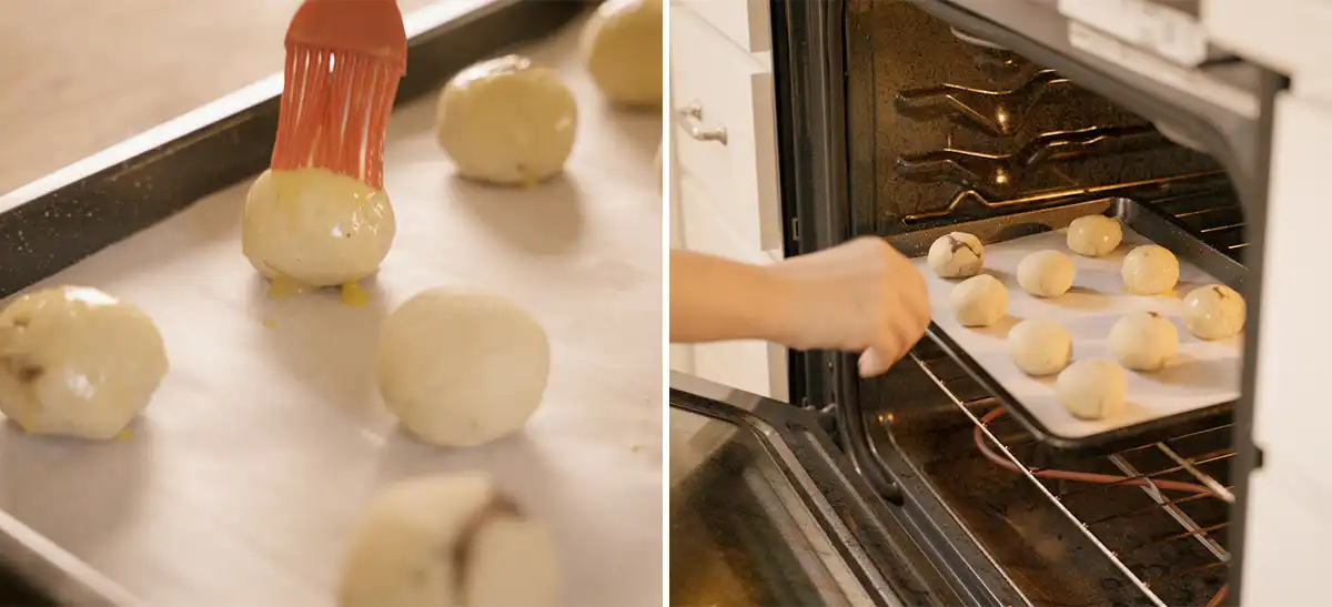 Formed manju pastries on a baking sheet being brushed with egg wash using a red silicone pastry brush Right: Baking sheet of unbaked Hawaiian manju being slid into the oven to bake